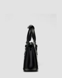 Bolso mini de piel&nbsp;Hair On&nbsp;con estampado dálmata in Crema & Negro