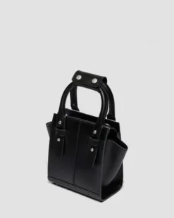 Bolso mini de piel&nbsp;Hair On&nbsp;con estampado dálmata in Crema & Negro
