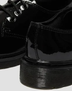 Zapatos 1461 para joven en charol in Negro